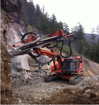 Pioneering a bench across the top of mountain slope in the spring of 2013 was the start of quarry development.